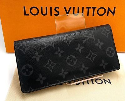 Louis Vuitton Brazza wallet M61697 in black Monogram Eclipse canvas, front view
